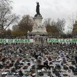 Hundreds of pairs of shoes were displayed at the Place de la Republique as part of a symbolic and peaceful rally called by the NGO Avaaz.