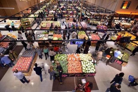 Shoppers in the produce section on opening day of the Burlington Wegmans supermarket. Josh Reynolds for The Boston Globe (NoWk, Kapteyn)

