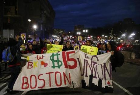 In November, protesters chanted as they marched towards the State House during a rally for minimum-wage workers who were seeking a raise to $15 per hour in Boston.

