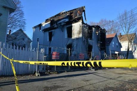 The three-family home was the scene of a fatal fire in Lynn. 
