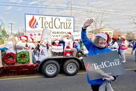 Claire Crouch with several Ted Cruz supporters wave at the crowds at a Christmas parade in Smyrna, Tenn. on Sunday, December 6, 2015. (Martin Cherry for The Boston Globe)
