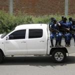 Military personnel sits aboard a vehicle driving through the Musaga neighbourhood of the city of Bujumbura on Friday.