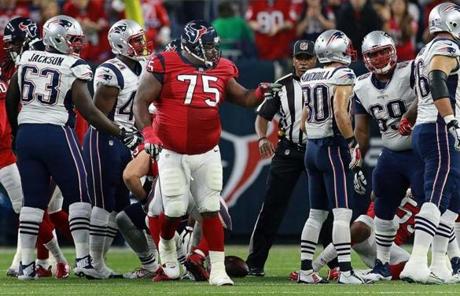 In a rare highlight for the Texans, former Patriot Vince Wilfork celebrated a first-quarter tackle.
