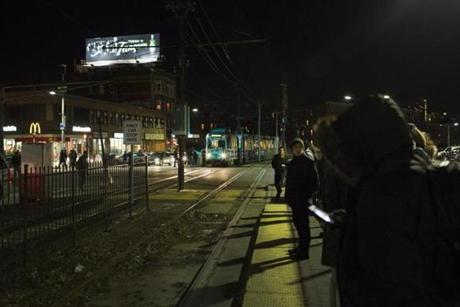 Riders waited for a late-night Green Line train on Commonwealth Avenue.
