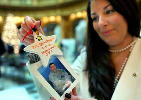 Tracy Vaillancort, of Worcester, held the star she decorated to remember her son, US Army Private First Class Brian Moquin Jr., who was 19 when he was killed in Afghanistan in May 2006.
