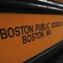 The side of a school bus for the Boston Public Schools system. 