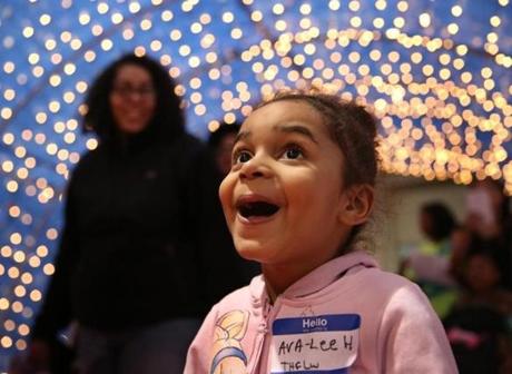 Three-year-old Avalee Henriquez was captivated as she entered the decorated hall at Christmas in the City through a lighted tunnel and saw artificial snow. 
