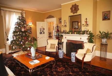 Boston, MA--12/21/2015--Living room. The Home Of The Week, at 155 Bellevue Street, in West Roxbury, is photographed, on Monday, December 21, 2015. Photo by Pat Greenhouse/Globe Staff Topic: 122715HomeOfTheWeek Reporter: John Ellement 
