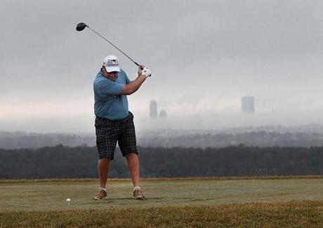 It was short pants and long lines at the Granite Links Golf Club in Quincy on Thursday as the morning fog shrouded the Boston skyline.
