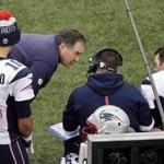 After talking it over with offensive coordinator Josh McDaniels (center), coach Bill Belichick decided to send the Patriots into halftime Sunday instead of letting Tom Brady try to move the offense while deep in New England territory. 