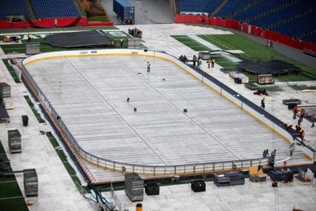 The rink for Friday?s Winter Classic at Gillette Stadium took hundreds of workers and thousands of man-hours to complete. 
