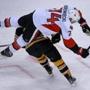 12/29/15: Boston, MA: The Senators Mark Borowiecki went crashing to the ice head first as he was upended by the Bruins Brad Marchand. Borowiecki left the ice after the hit, struggling to stay upright as he headed for the locker room. The Boston Bruins hosted the Ottawa Senators in a regular season NHL hockey game at the TD Garden. (Globe Staff Photo/Jim Davis) section:sports topic:Bruins-Senators