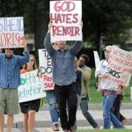 A group of playful protesters picketed outside the Museum of Fine Arts in October, expressing their dislike of painter Pierre-Auguste Renoir?s work.