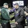 Green Bay Packers head coach Mike McCarthy meets with Minnesota Vikings head coach Mike Zimmer following an NFL football game in Minneapolis, Sunday, Nov. 22, 2015. The Packers defeated the Vikings 30-13. (AP Photo/Ann Heisenfelt)
