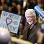 Former President Bill Clinton waved to a cheering crowd as he arrived during a campaign stop for his wife.