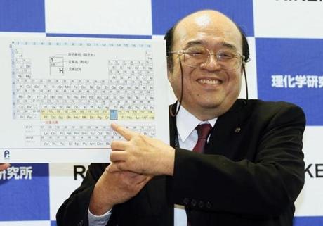 Kosuke Morita of Riken Nishina Center for Accelerator-Based Science pointed at a periodic table of the elements during a press conference on Dec. 31. A team of Japanese scientists have met the criteria for naming a new element, the synthetic highly radioactive element 113, more than a dozen years after they began working to create it. 
