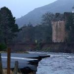 A large portion of the riverbank next to Abergeldie Castle in Ballater, Scotland, was washed away, along with a section of the A93 roadway nearby. 