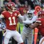 FILE - In this Sunday, Jan. 3, 2016 file photo, Kansas City Chiefs quarterback Alex Smith (11) throws as offensive tackle Eric Fisher (72) blocks Oakland Raiders defensive back Dewey McDonald (35) during the first half of an NFL football game in Kansas City, Mo. (AP Photo/Ed Zurga)