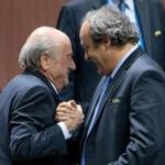 Sepp Blatter (left) shook hands with  Michel Platini during the 65th FIFA Congress at Hallenstadion in Zurich, Switzerland. 