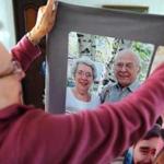 Frances Iacobucci, 85, with a picture of herself and her husband, Michael. Frances could not be at her husband?s side at Milford Regional Medical Center when he died.