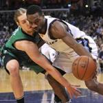 Kelly Olynyk (left) attempted to steal the ball away from former Celtic Tony Allen.