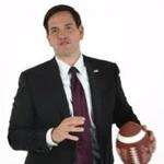 Presidential candidate Marco Rubio caught a football while fielding questions in a new television ad.