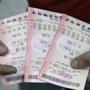 A customer showed his Powerball tickets in Hialeah, Fla., on Monday.