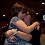 Boston, MA -- 01/14/16 -- Jane Richard, 9, and Denise Richard share a moment during the fundraising kickoff for Team MR8, at Fenway Park on January 14, 2016, in Boston, Massachusetts. (Kayana Szymczak for the Boston Globe)