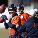 Denver Broncos quarterback Peyton Manning looks to throw a pass during an NFL football practice at the team's headquarters Wednesday, Jan. 13, 2016, in Englewood, Colo. The Broncos will host the Pittsburgh Steelers in a second-round AFC playoff game Sunday in Denver. (AP Photo/David Zalubowski)