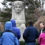 Stephen Pinkerton (facing front at right), a docent at Mount Auburn Cemetery, told a tour group about the history of the Sphinx, a Civil War monument erected in 1872.
