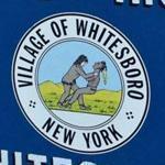 A welcome sign in Whitesboro, N.Y., displays the village seal. 