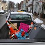City workers collected space savers Tuesday.