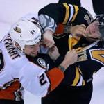 01/26/16: Boston, MA: Anaheim's Chris Stewart (left) and the Bruins Torey Krug (right) each got five minutes for fighting in the first period. The Boston Bruins hosted the Anaheim Ducks in a regular season NHL hockey game at the TD Garden. (Globe Staff Photo/Jim Davis) section:sports topic:Bruins