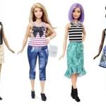 Mattel has released photos of new Barbies, featuring different body types and skin tones.