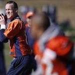 Denver Broncos quarterback Peyton Manning looked to throw to wide receiver Andre Caldwell Thursday in practice.
