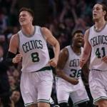 Boston, MA - 01/29/16 - (4th quarter) Boston Celtics forward Jonas Jerebko (8), Boston Celtics guard Marcus Smart (36), and Boston Celtics center Kelly Olynyk (41) brought the Celtics fans to their feet as they head to the bench during a fourth quarter timeout with a 106-81 lead over the Orlando Magic. The Boston Celtics take on the Orlando Magic at TD Garden. - (Barry Chin/Globe Staff), Section: Sports, Reporter: Adam Himmelsbach, Topic: 30Celtics-Magic, LOID: 8.2.1410611946. 