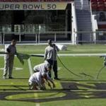 Grounds crew painted the field at Levi?s Stadium on Tuesday in preparation for Super Bowl 50.