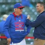FILE - In this April 13, 2015, file photo, Theo Epstein, right, Chicago Cubs president of baseball operations, talks with Cubs manager Joe Maddon during batting practice before the Cubs' baseball game against the Cincinnati Reds in Chicago. With runs at a premium in the major leagues, a handful of teams are trying to help their young hitters with a high-tech program known as neuroscouting. The details are being treated as a state secret by three clubs believed to be using the product--the Cubs, Red Sox and Rays. (AP Photo/Jeff Haynes, File)