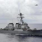 The U.S. Navy guided-missile destroyer USS Curtis Wilbur patrols in the Philippine Sea in this August 15, 2013 file photo. The destroyer sailed within 12 nautical miles of an island claimed by China and two other states in the South China Sea on January 30, 2016 to counter efforts to limit freedom of navigation, the Pentagon said. REUTERS/U.S. Navy/Mass Communication Specialist 3rd Class Declan Barnes/Handout via Reuters/Files ATTENTION EDITORS - THIS PICTURE WAS PROVIDED BY A THIRD PARTY. THIS PICTURE IS DISTRIBUTED EXACTLY AS RECEIVED BY REUTERS, AS A SERVICE TO CLIENTS. FOR EDITORIAL USE ONLY. NOT FOR SALE FOR MARKETING OR ADVERTISING CAMPAIGNS. 