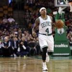 Boston Celtics guard Isaiah Thomas (4) dribbles up court in the first quarter of an NBA basketball game against the Orlando Magic, Friday, Jan. 29, 2016, in Boston. (AP Photo/Elise Amendola)