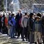 Nashua, New Hampshire -- 2/2/2016- People wait in line for a Hillary Clinton and Bill Clinton Get Out The Vote rally at Nashua Community College in Nashua, New Hampshire February 2, 2016. Jessica Rinaldi/Globe Staff Topic: 03dems Reporter: 