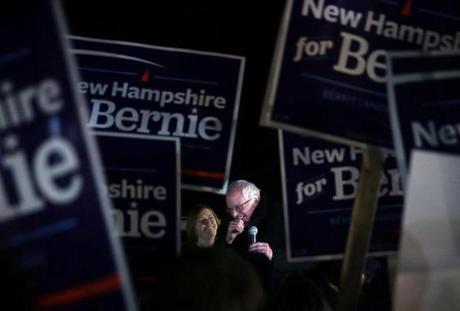 CONCORD, NH - FEBRUARY 02: Democratic presidential candidate Sen. Bernie Sanders (I-VT) (R) speaks to supporters as his wife Jane O'Meara Sanders (L) looks on February 2, 2016 in Concord, New Hampshire. Sanders placed a visit to a group of supporters who wait for his arrival on an early morning flight after he had a tight race with Hillary Clinton in the Iowa Caucus. (Photo by Alex Wong/Getty Images)

