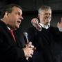 Republican presidential candidate, New Jersey Gov. Chris Christie, left, speaks as Massachusetts Gov. Charlie Baker applauds at a campaign event, Saturday, Feb. 6, 2016, in Bedford, N.H. Baker announced his endorsement of Christie for president. (AP Photo/Elise Amendola)