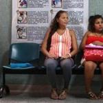 Windy Gelvez MandÃ³n, center, 21, worried about the Zika virus waits to be checked at the Hospital Universitario Erasmo Meoz in CÃºcuta, Colombia, on February 4, 2016. MandÃ³n, in her final trimester, is worried about the possibility that her baby might also become infected. 