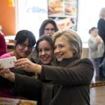 Former Secretary of State Hillary Clinton offered some camera time with Dunkin? Donuts customers in Manchester.