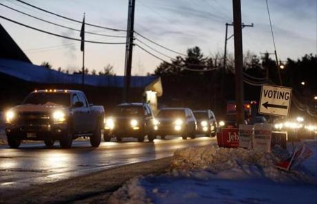 Voters waited in a miles-long line of traffic to vote in the N.H. Primary in Merrimack. 
