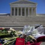 A copy of the US Constitution was placed among flowers outside the US Supreme Court. 