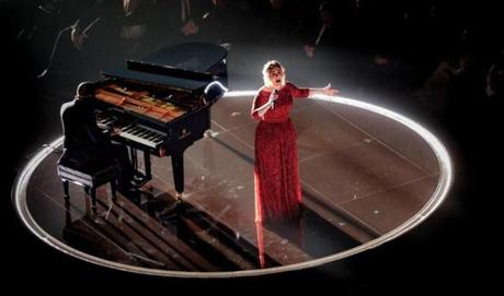 Adele performs during The 58th Grammy Awards Monday in Los Angeles.
