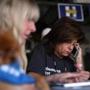 Jan Walker (left) and Laura Graup made phone calls Wednesday to voters as they volunteered for the Hillary Clinton campaign in Summerlin, Nev. 