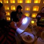 Besito in Chestnut Hill offers guests mini flashlights to help them read the menu. 